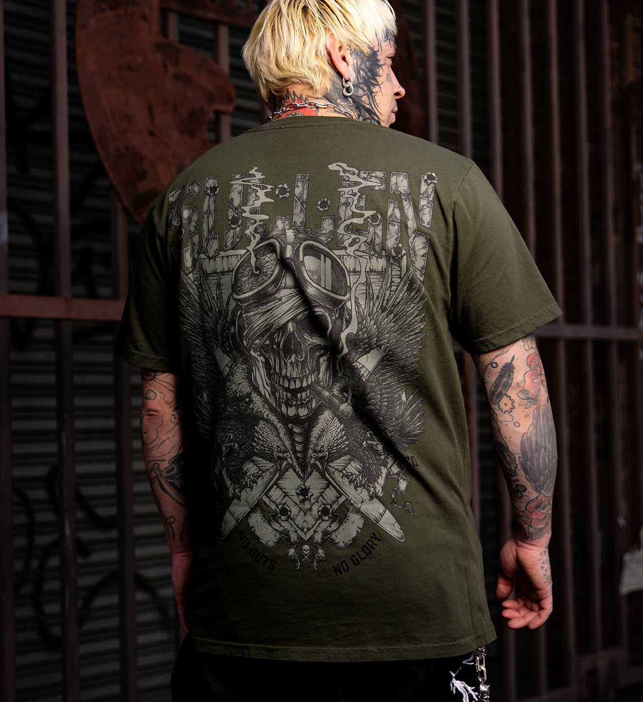 MODEL WEARING SULLEN CLOTHING FIGHTER PREMIUM TEE IN ARMY GREEN