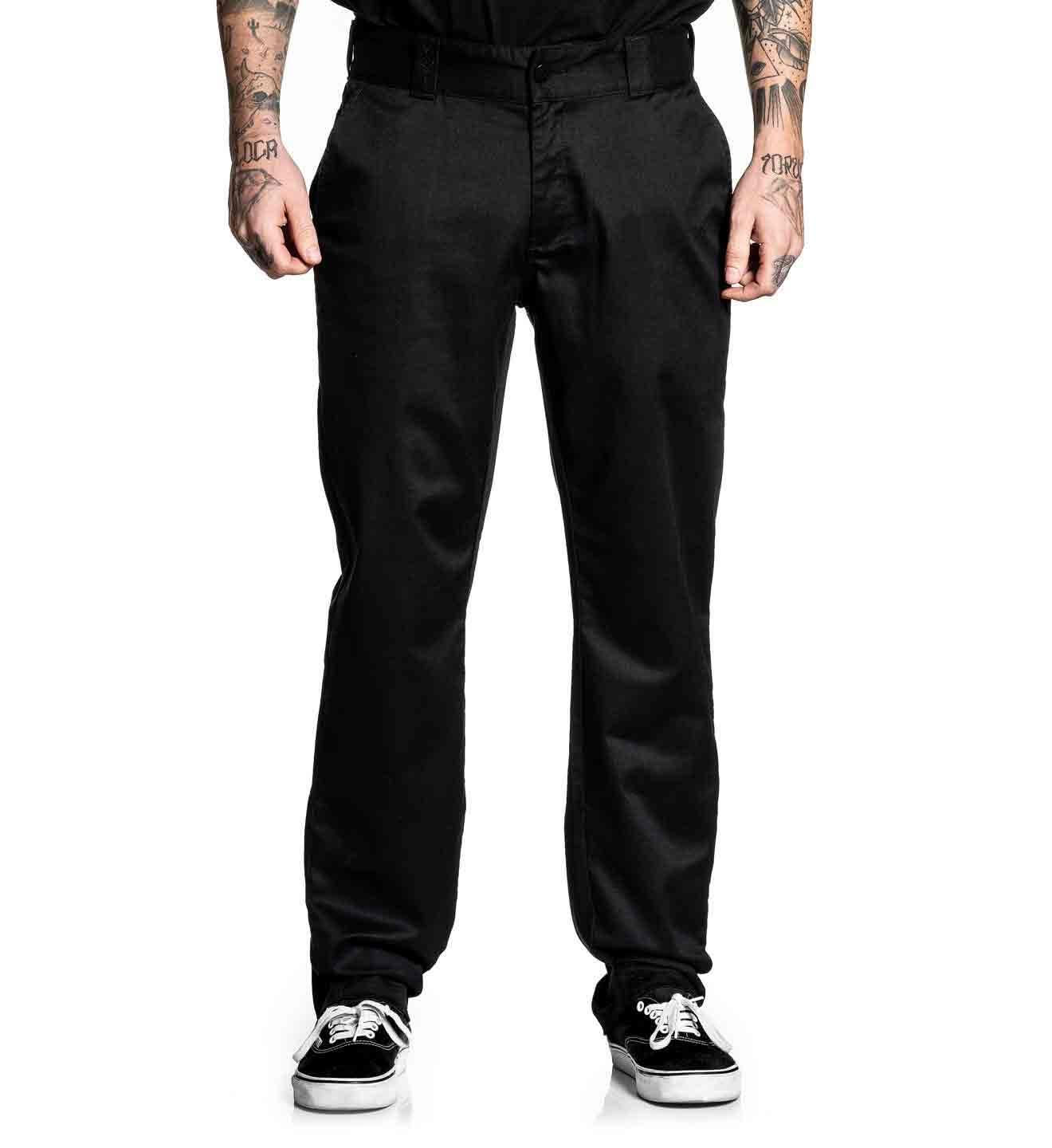 Person wearing black pants on a white background