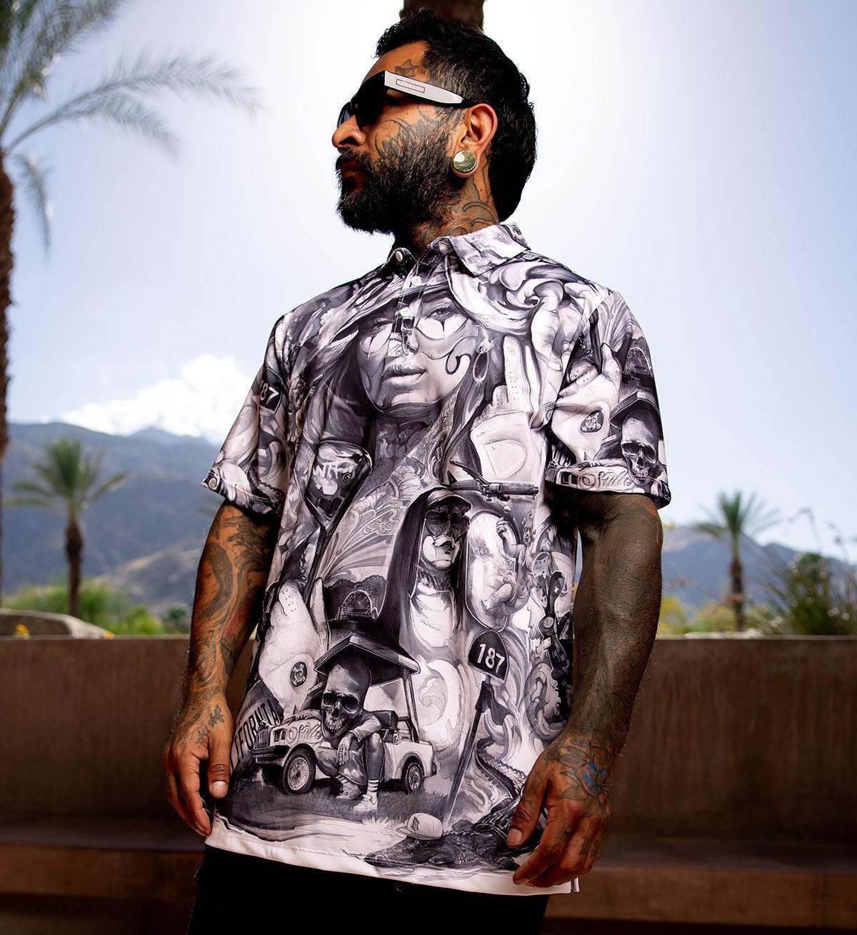 Man wearing a patterned shirt with a scenic background