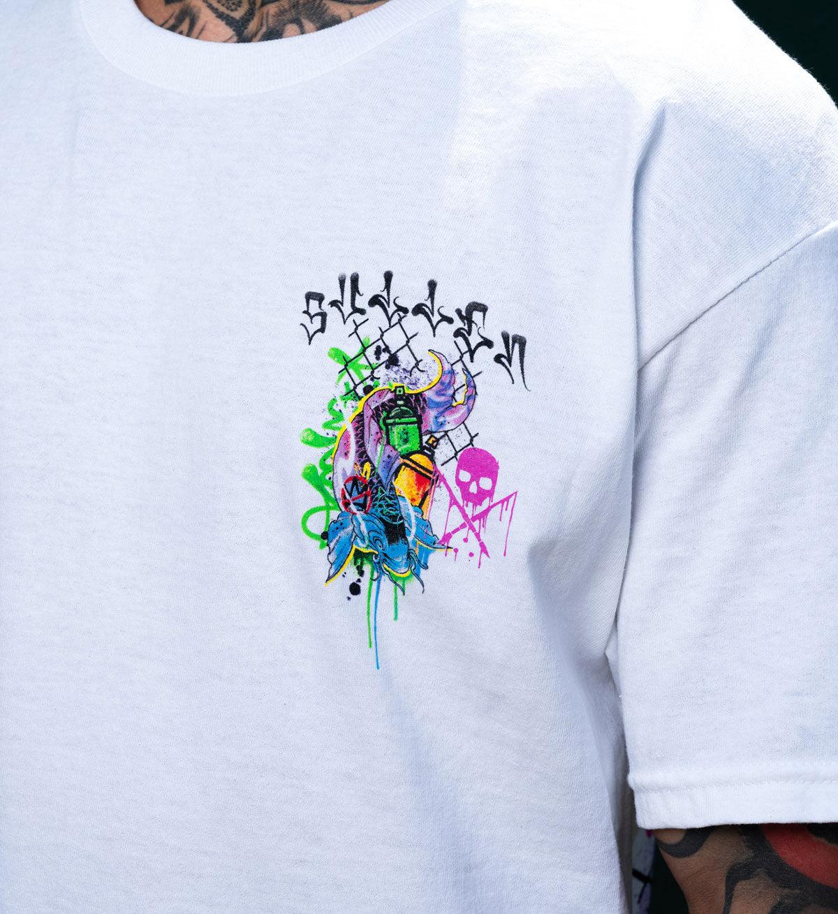 White t-shirt with colorful graphic design on the sleeve