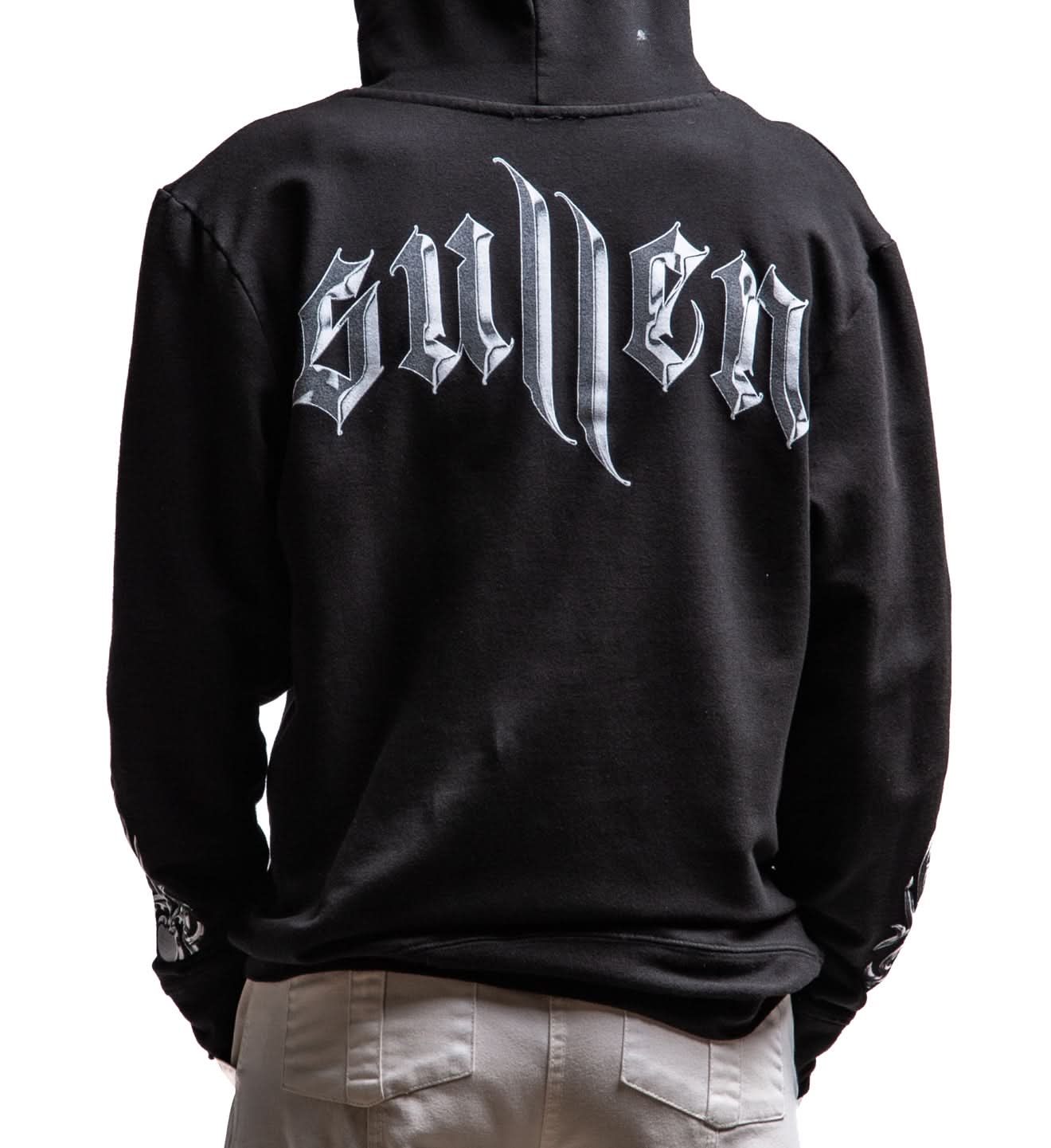 Black hoodie with 'Sullen' logo on the back, worn by a person.