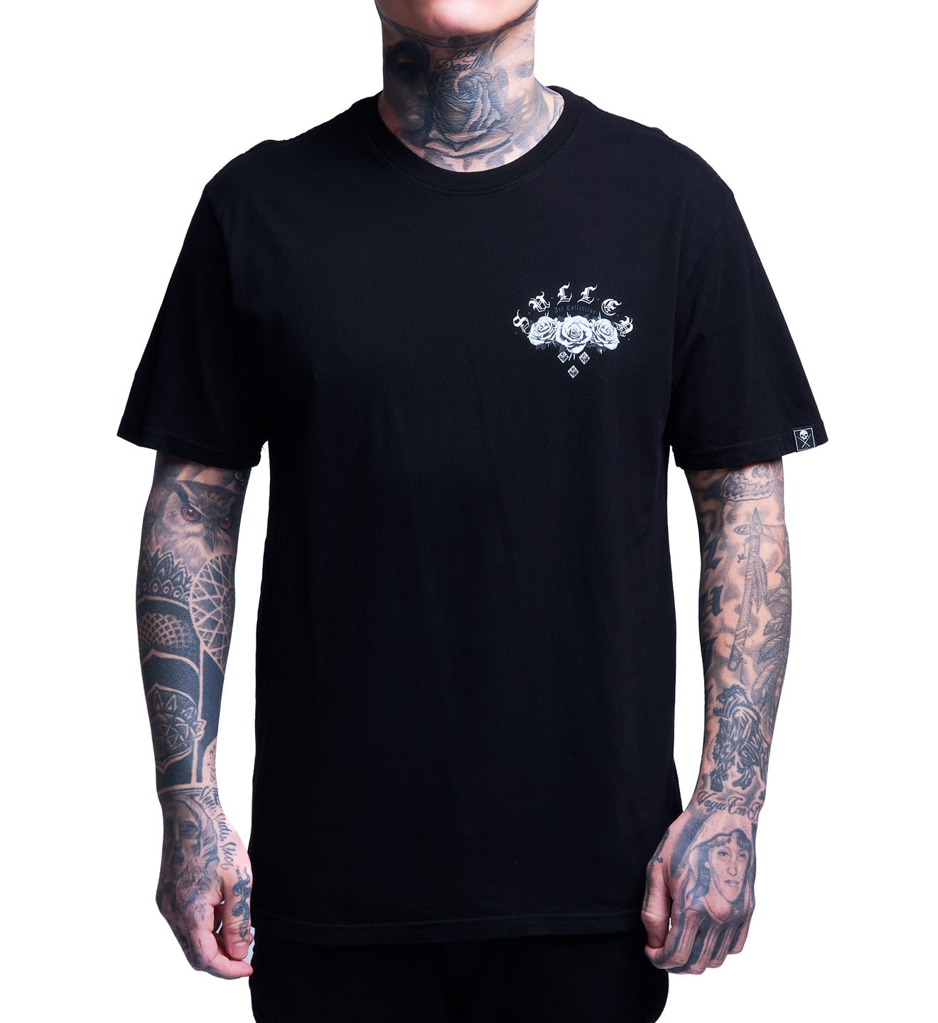 Person wearing a black t-shirt with a white logo on a white background