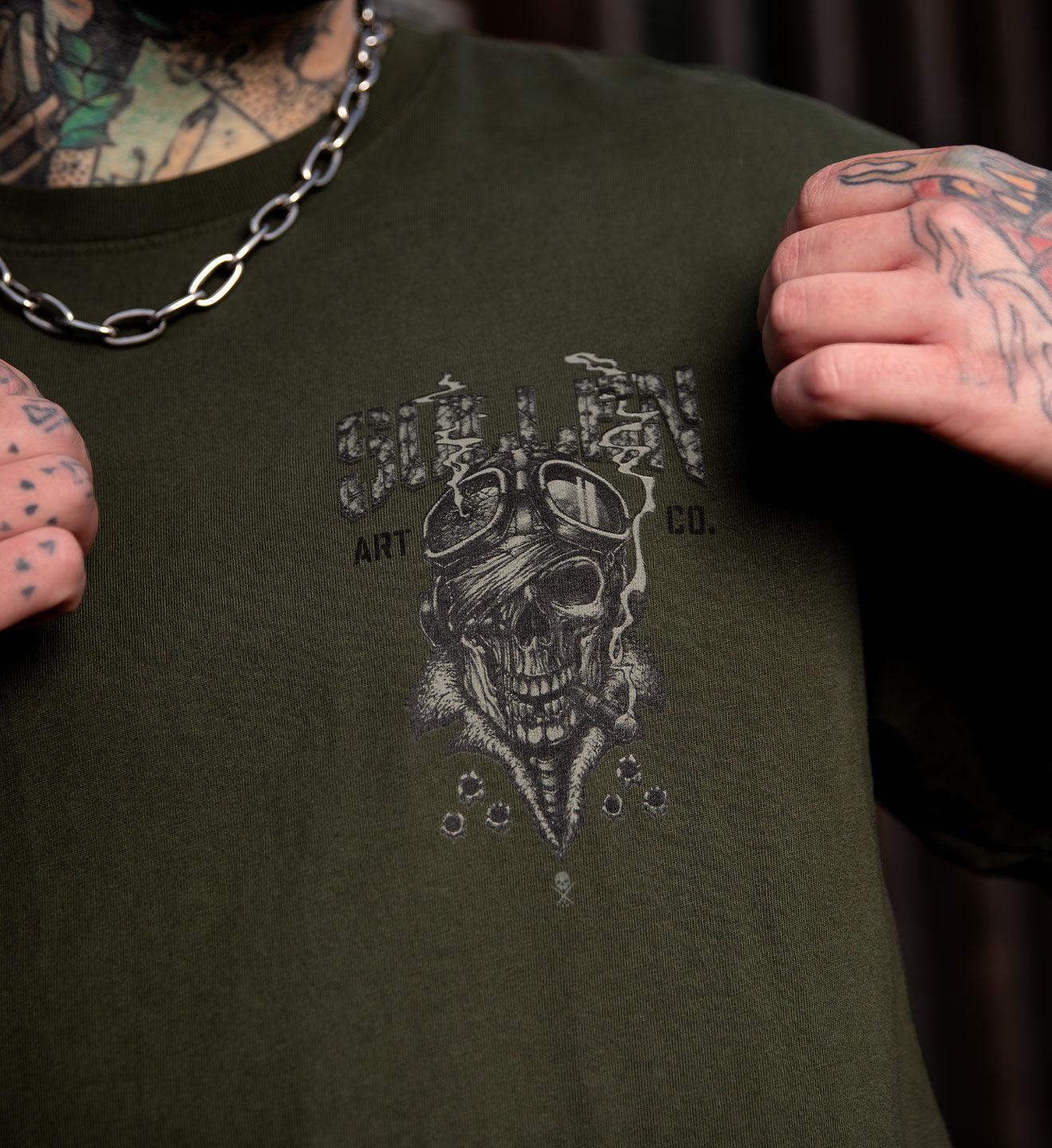 MODEL WEARING SULLEN CLOTHING FIGHTER PREMIUM TEE IN ARMY GREEN