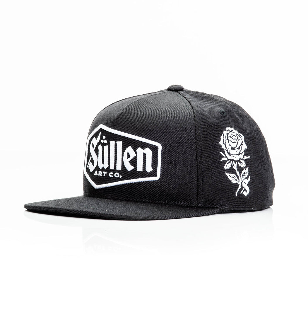 Black cap with white logo and rose design on a white background