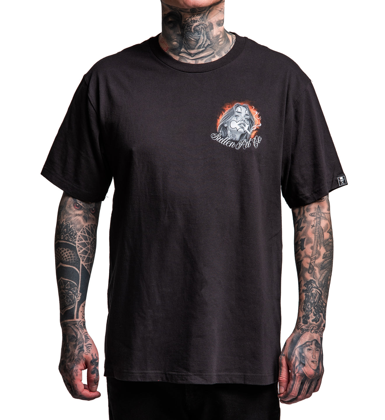 Person wearing a black t-shirt with a logo on a white background