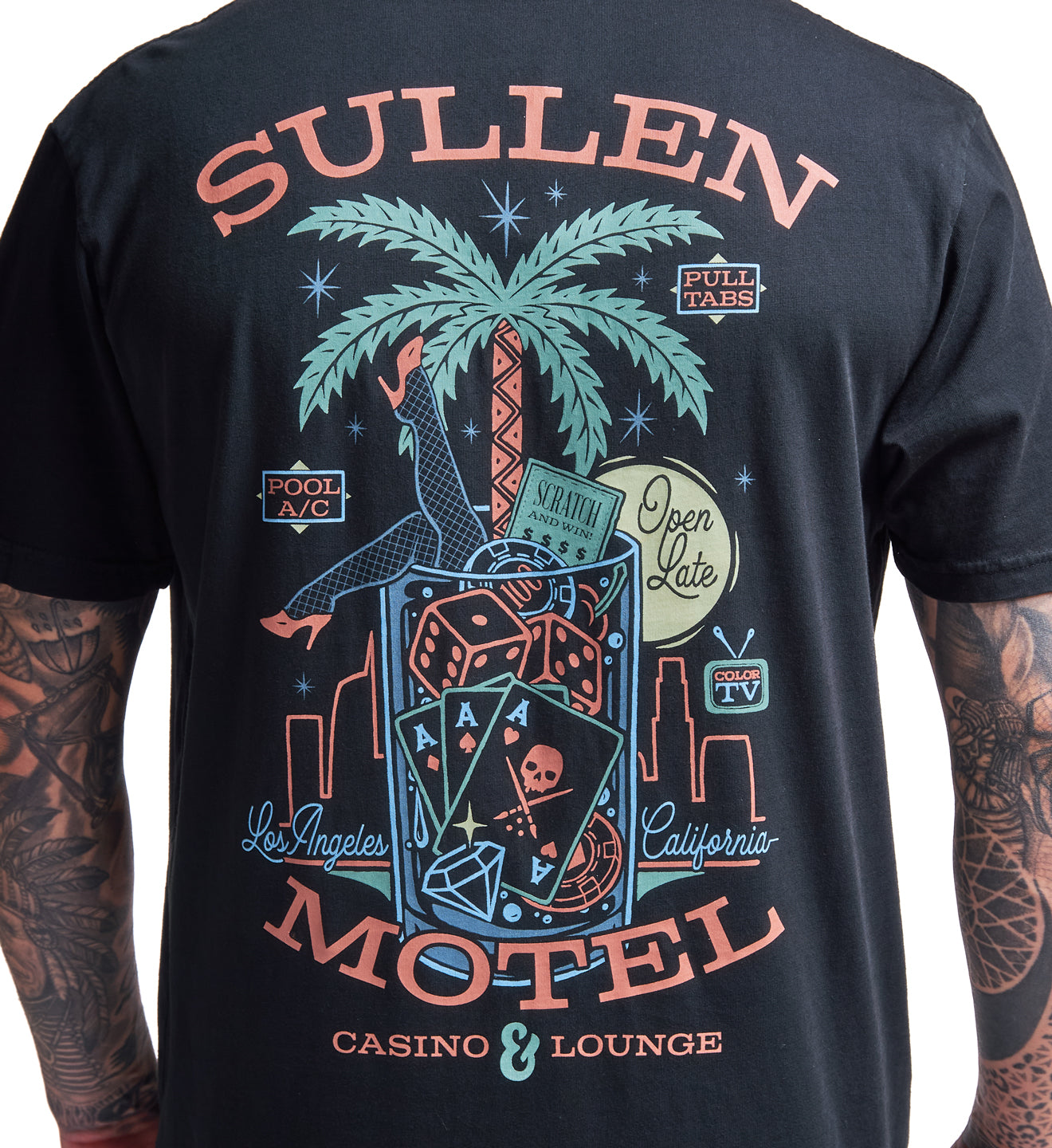 Black t-shirt with colorful graphic design featuring a palm tree and text on a white background