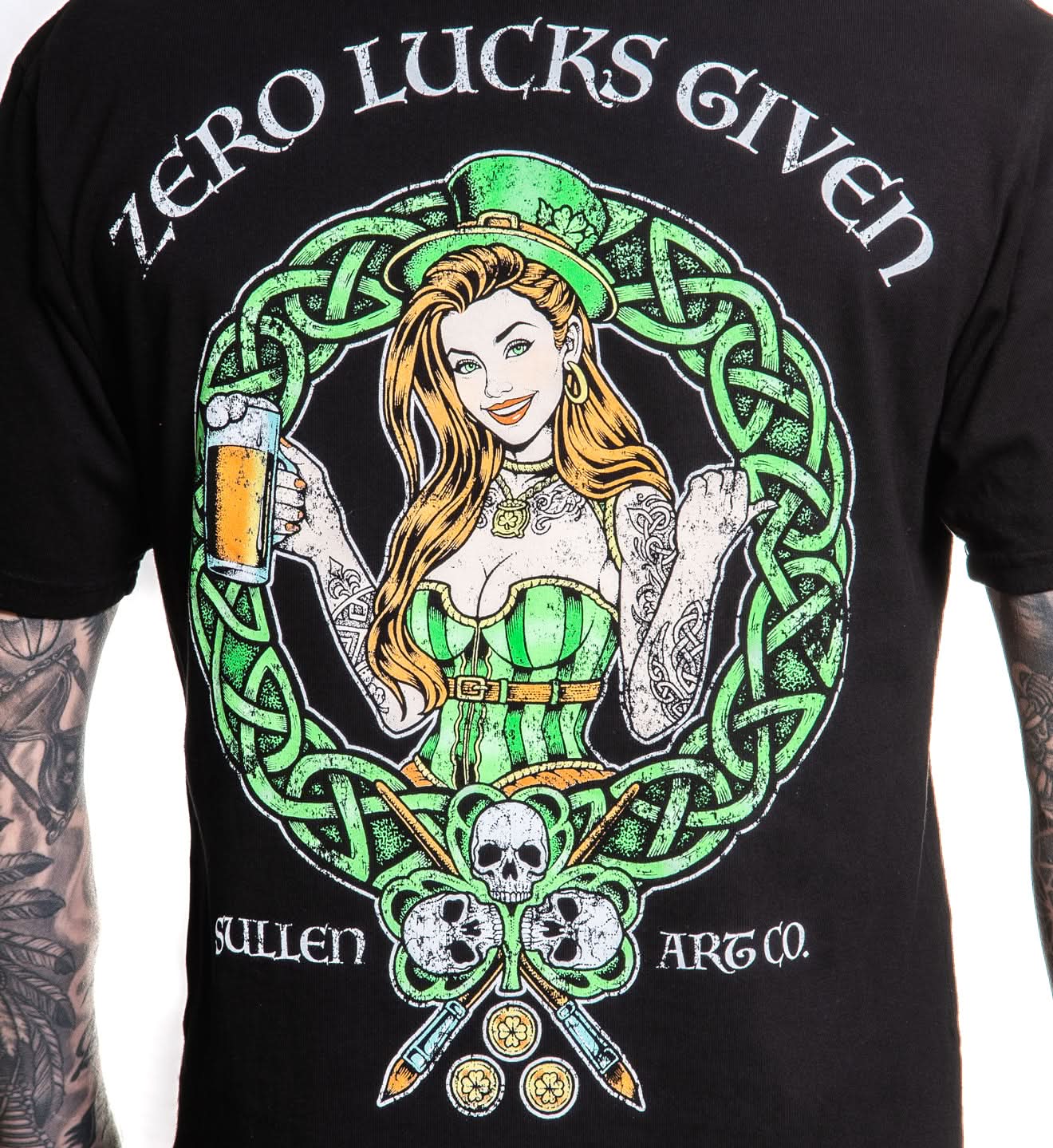 Black t-shirt with a graphic design of a woman holding a beer, surrounded by green Celtic knotwork, with 'Zero Lucks Given' text above and 'Sullen Art Co' below.