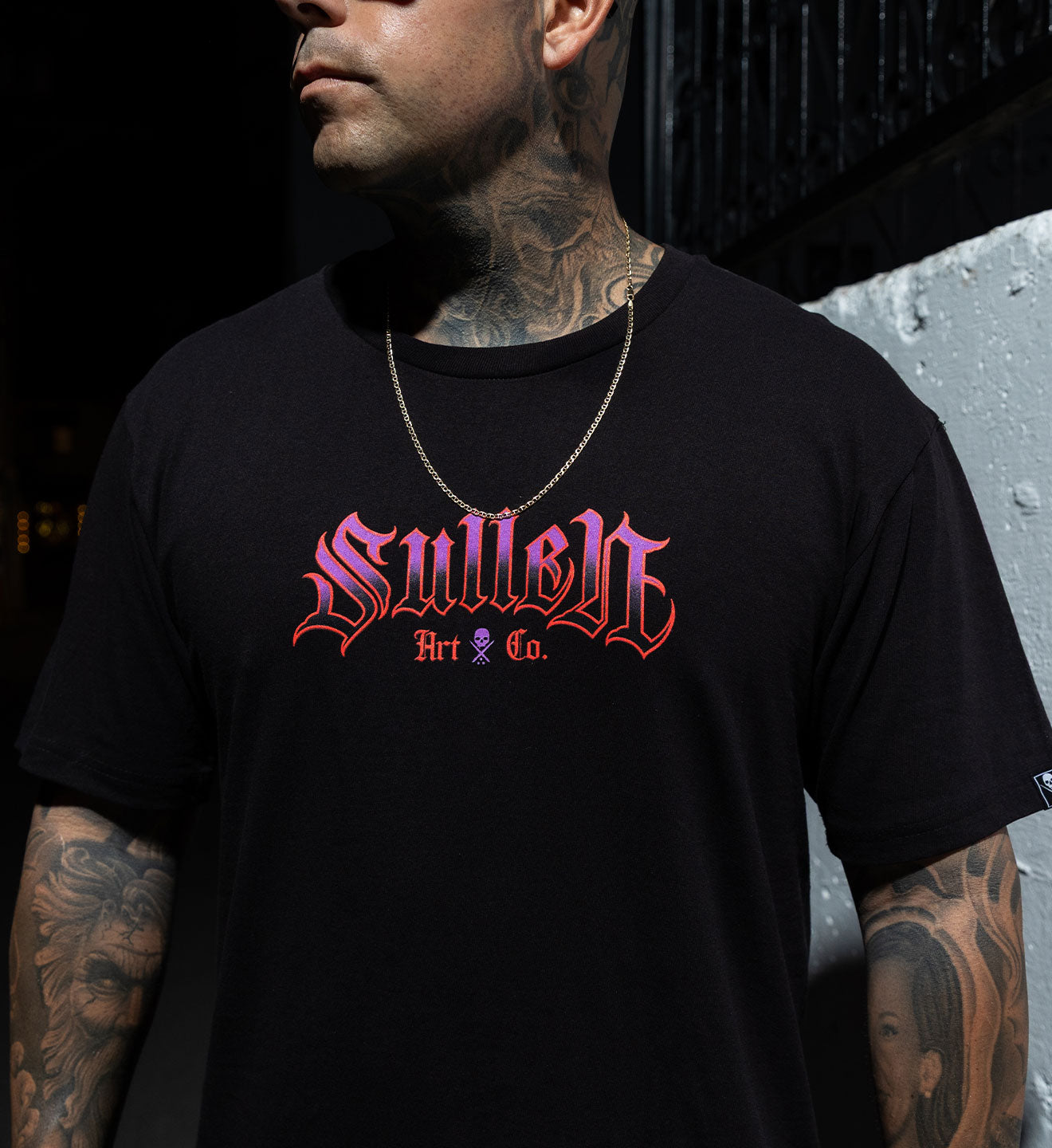 Model wearing Sullen Clothing graphic tee
