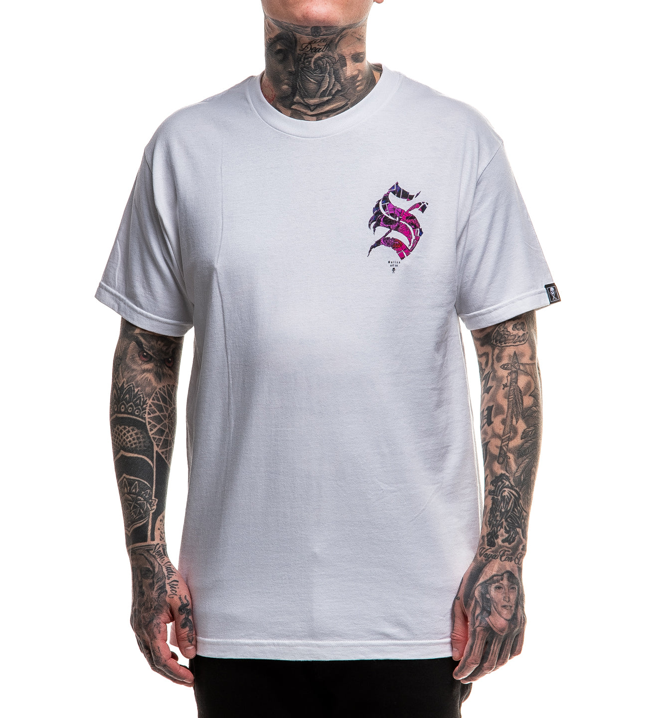 Person wearing a gray t-shirt with a logo on a white background