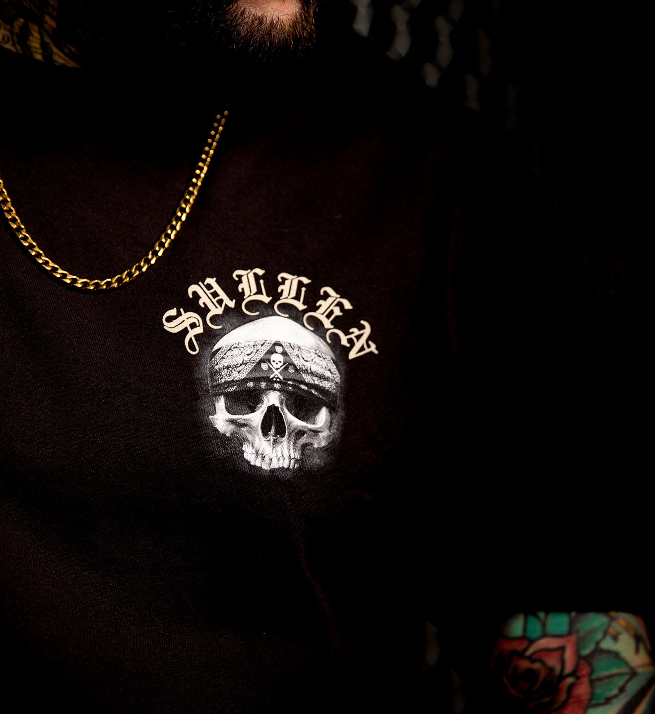 Black shirt with skull design and 'Sullen' branding on a dark background