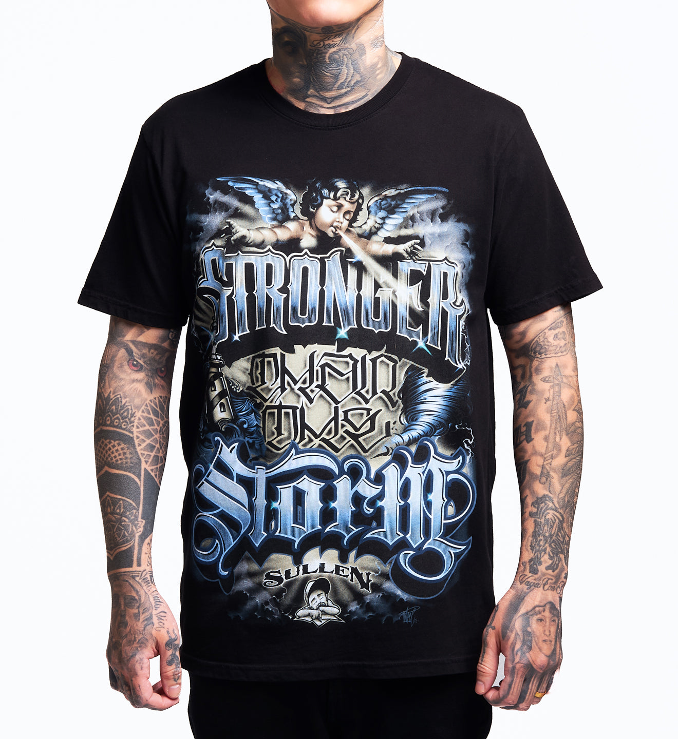 Black t-shirt with graphic design and text worn by a person with tattoos