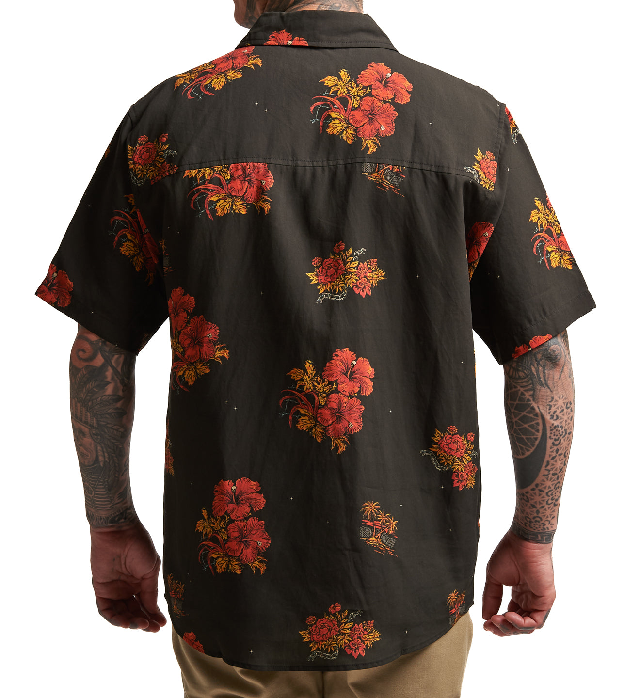 Black shirt with red floral patterns worn by a person on a white background