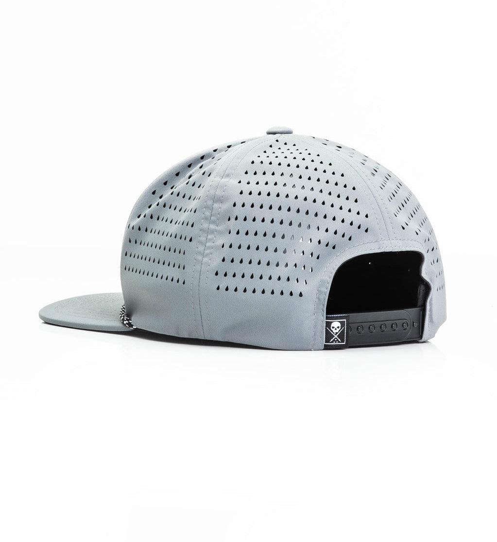 Gray cap with perforated design on a white background