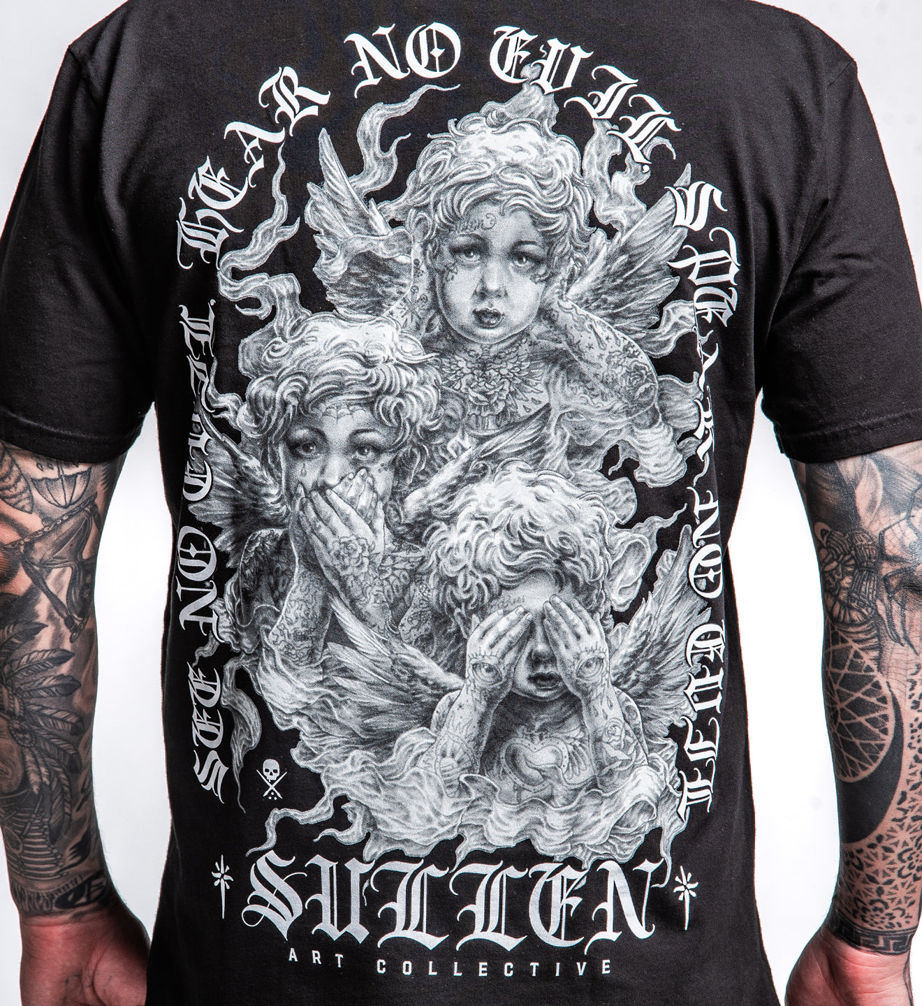 Black t-shirt with a graphic design of three angelic figures and text on a white background