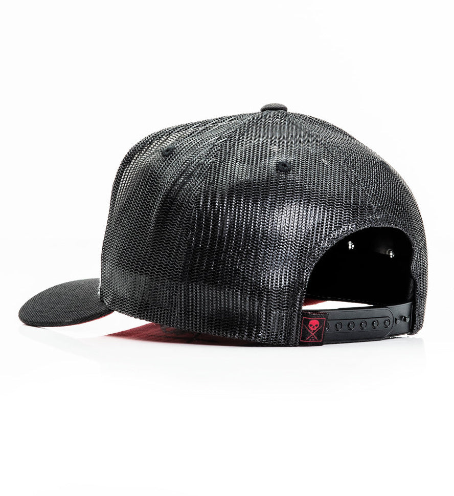 Black cap with a textured pattern on a white background