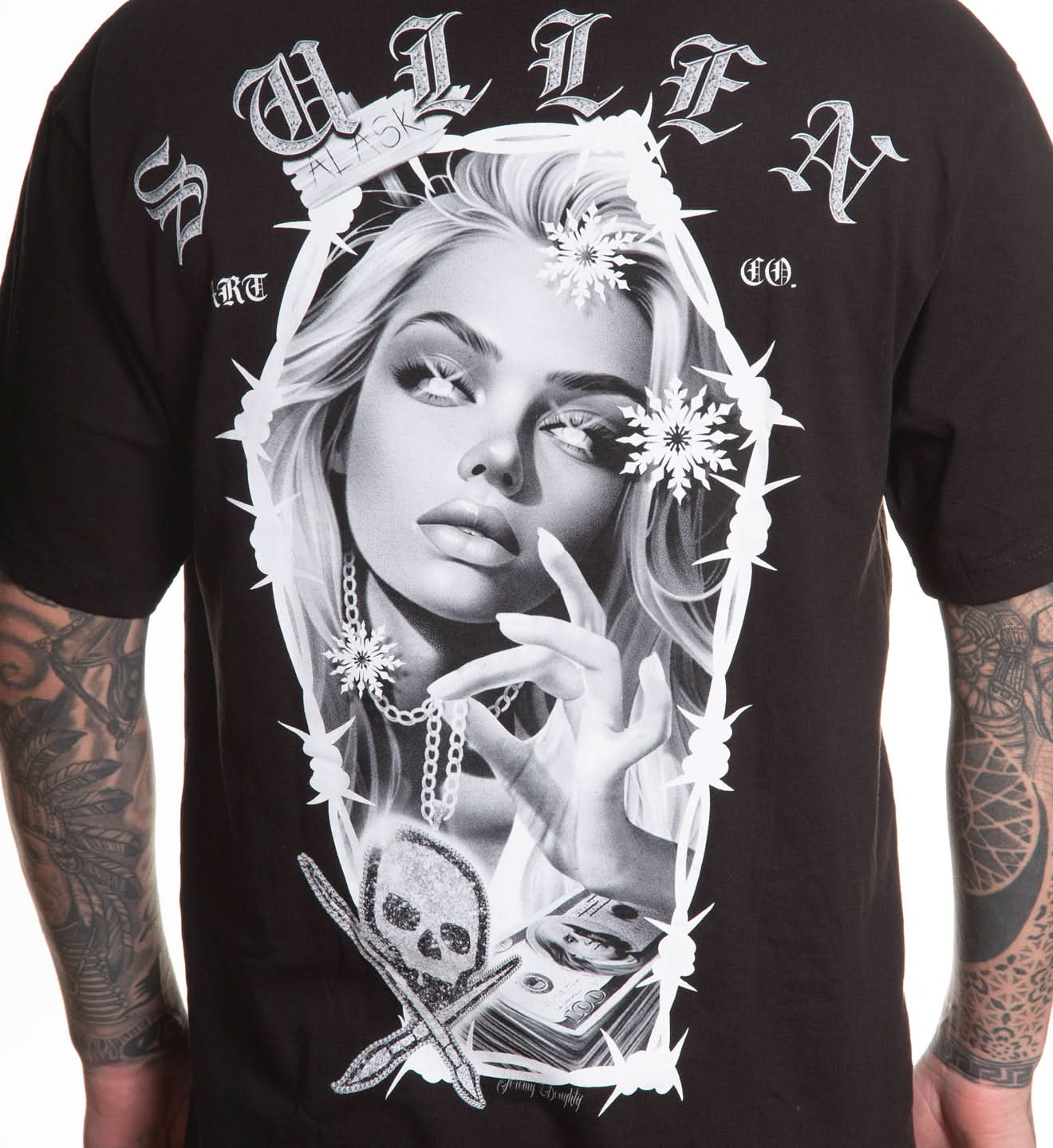 Black t-shirt with a graphic design of a woman's face, barbed wire, and text on a white background.