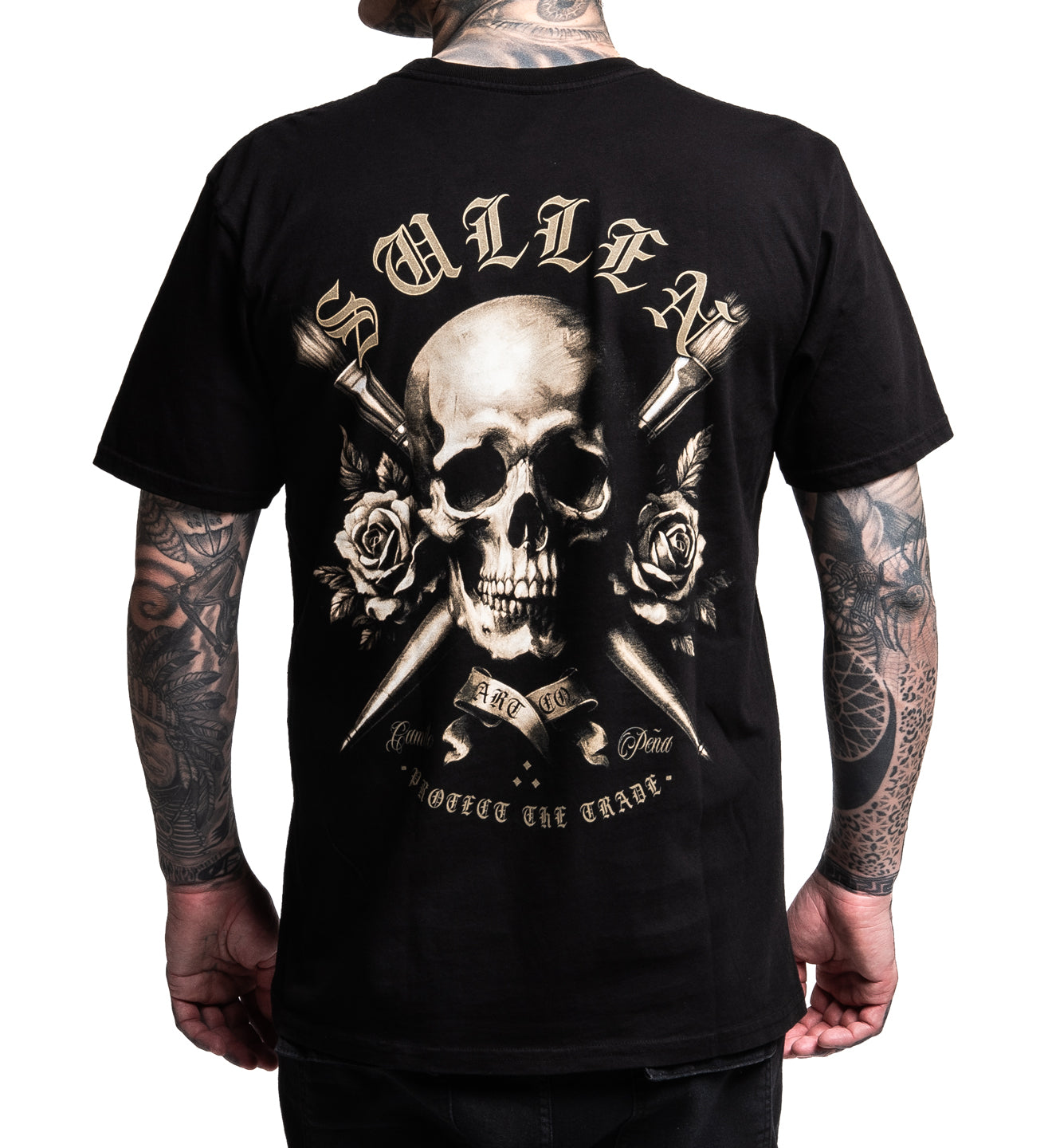 Black t-shirt with skull and roses design on a white background