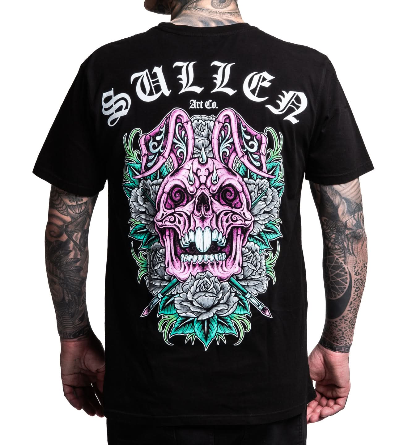 Black t-shirt with colorful skull design and 'Sullen' branding on a white background