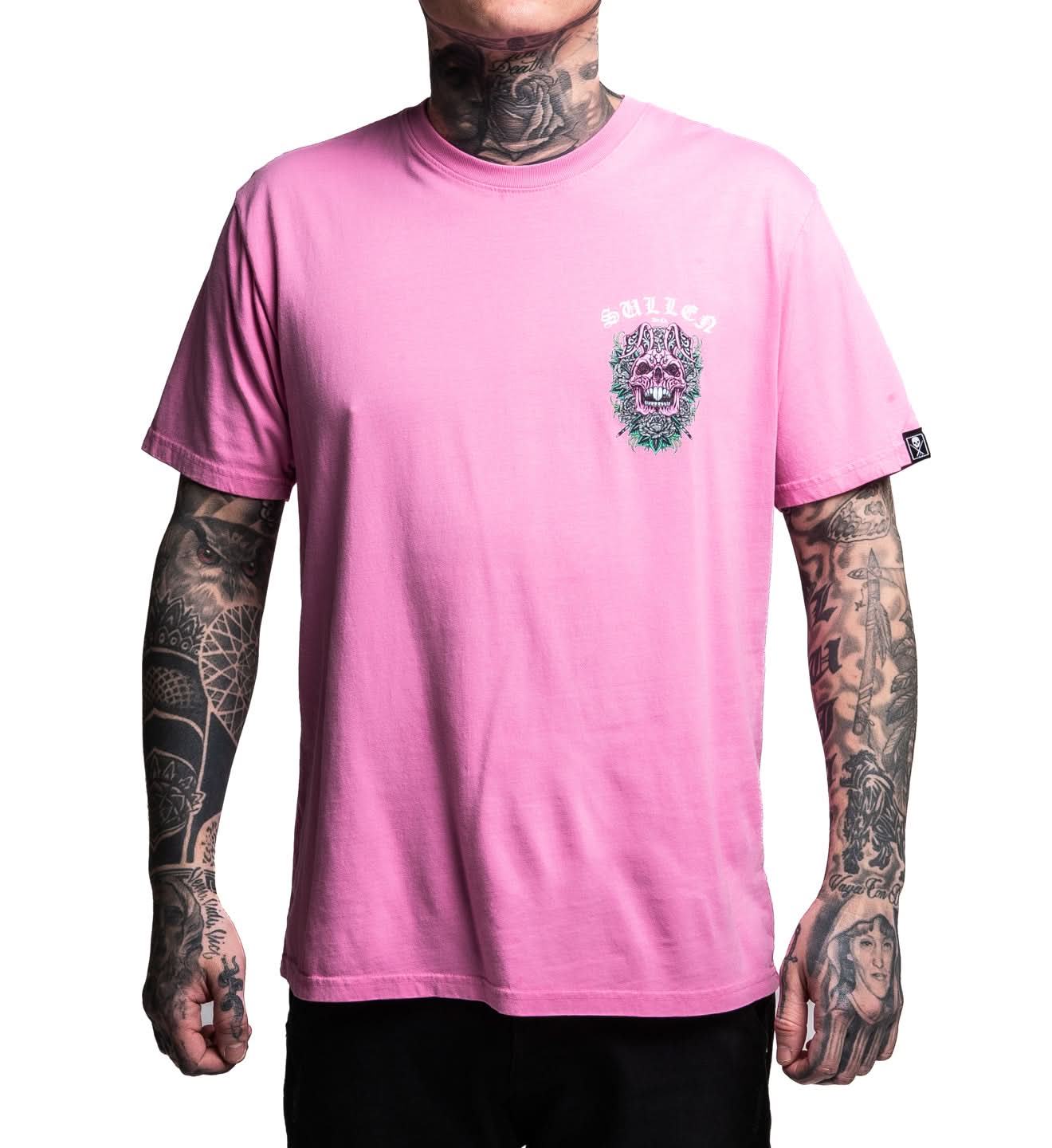 Person wearing a pink t-shirt with a graphic design on a white background