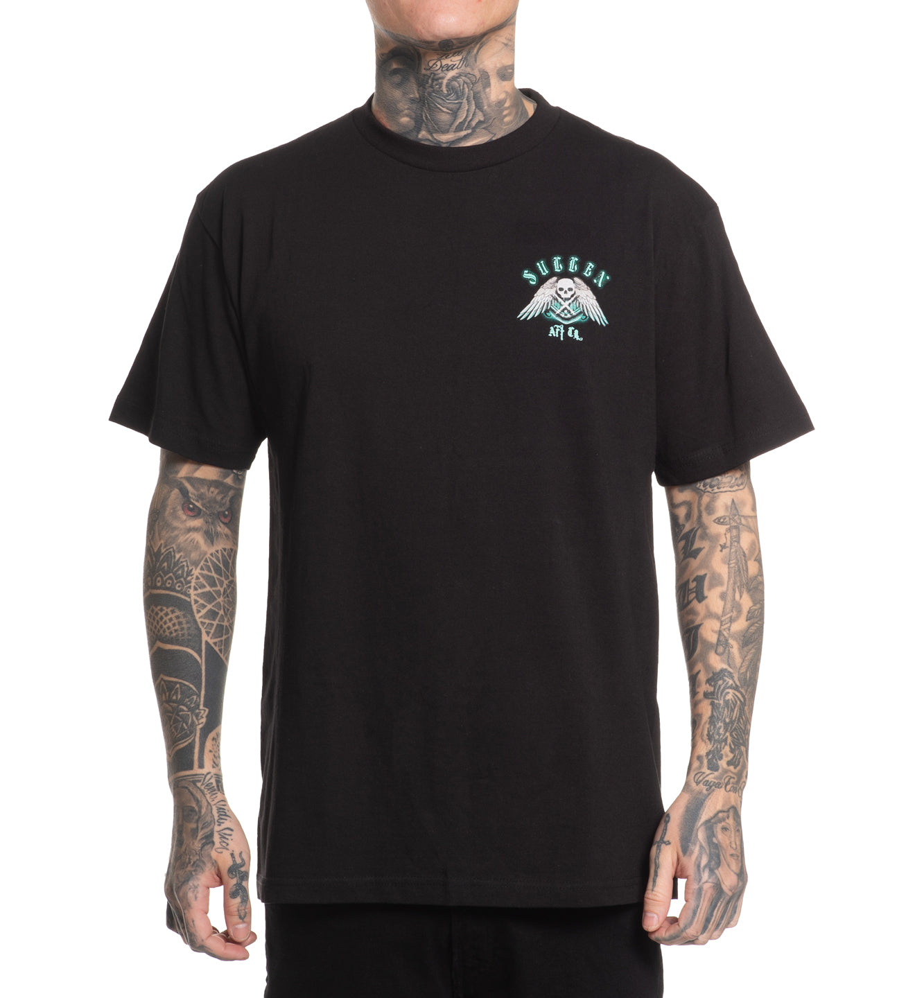 Black t-shirt with a logo on the chest worn by a person with tattoos.