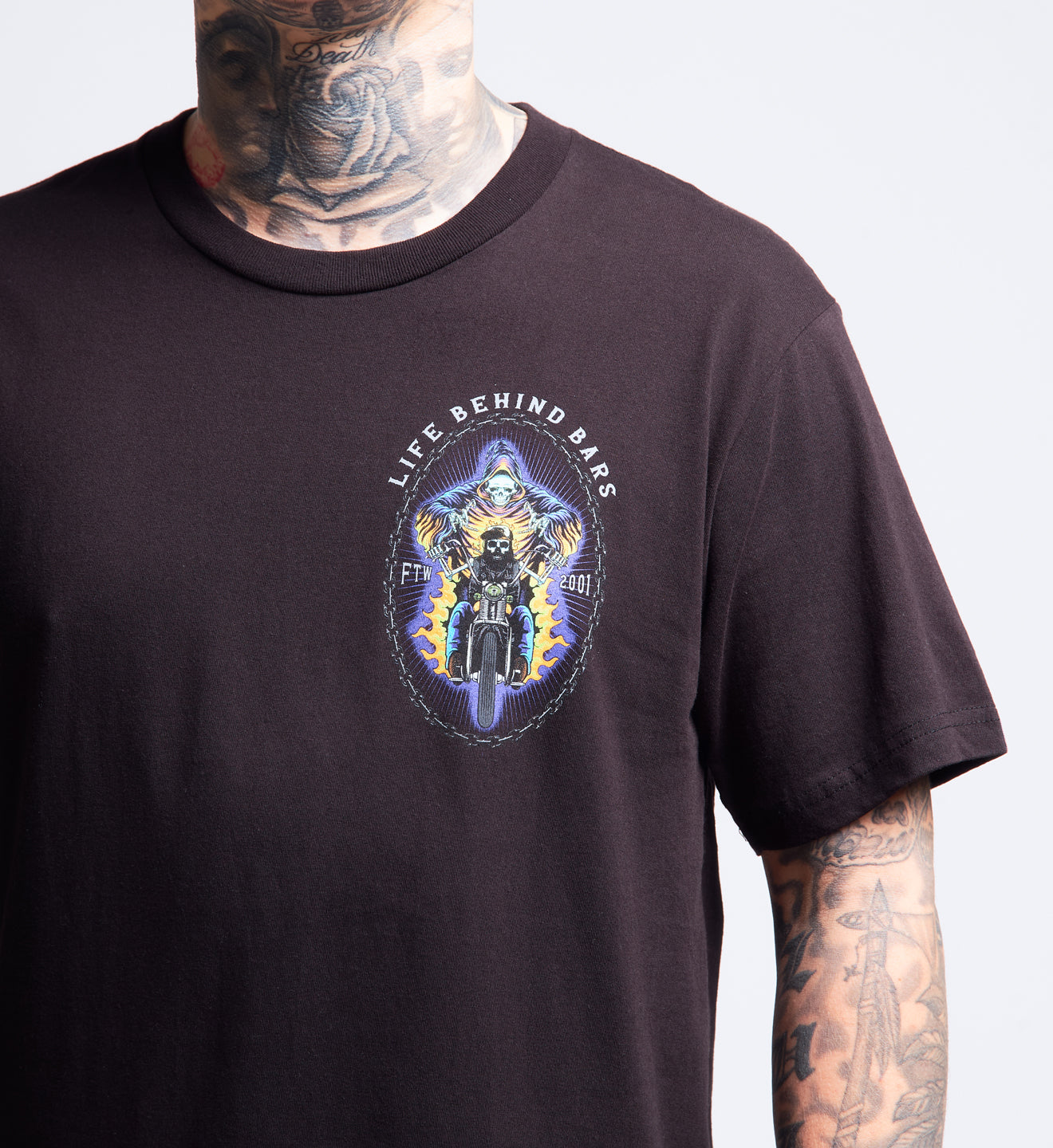 Black t-shirt with a graphic design and text on a plain background