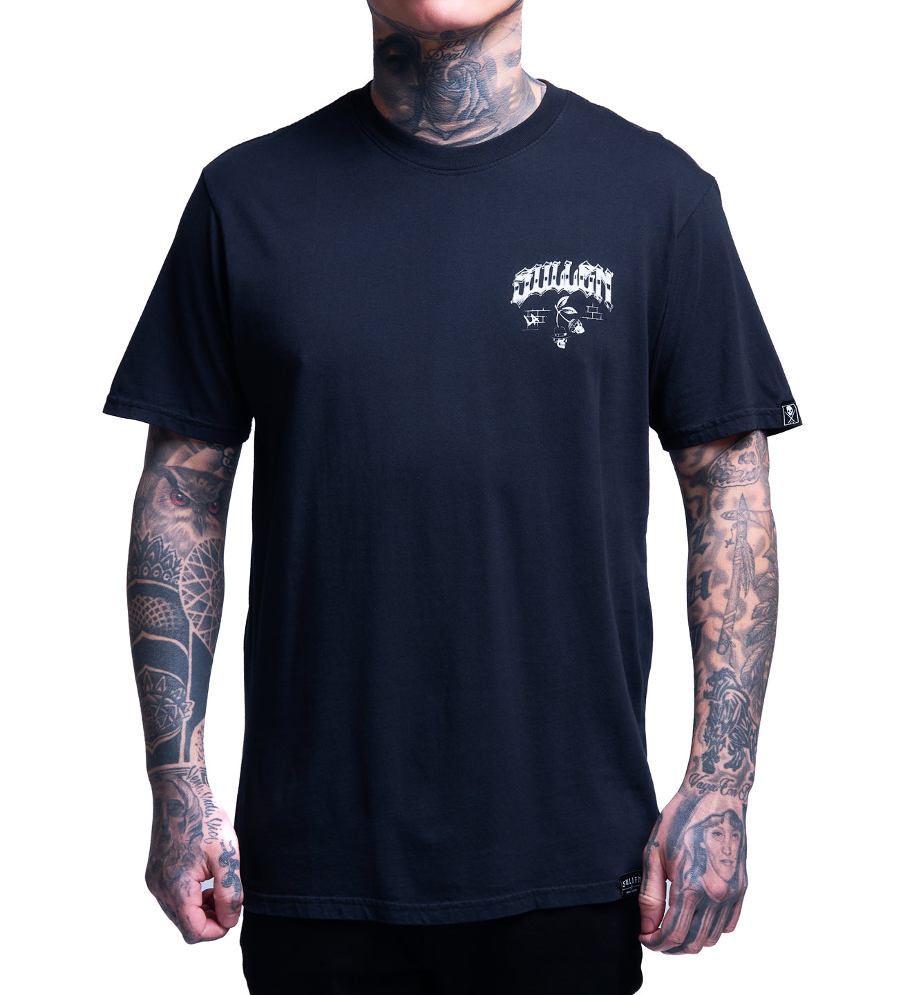 Person wearing a black t-shirt with a logo on a white background