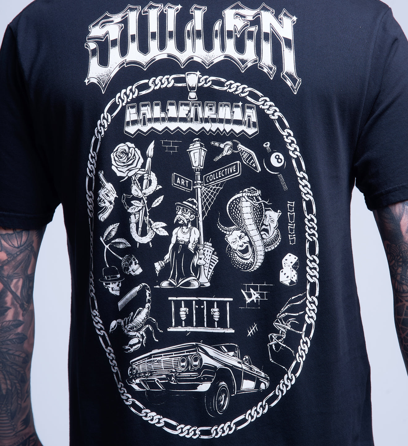 Black t-shirt with white graphic design and 'Sullen' branding on a plain background