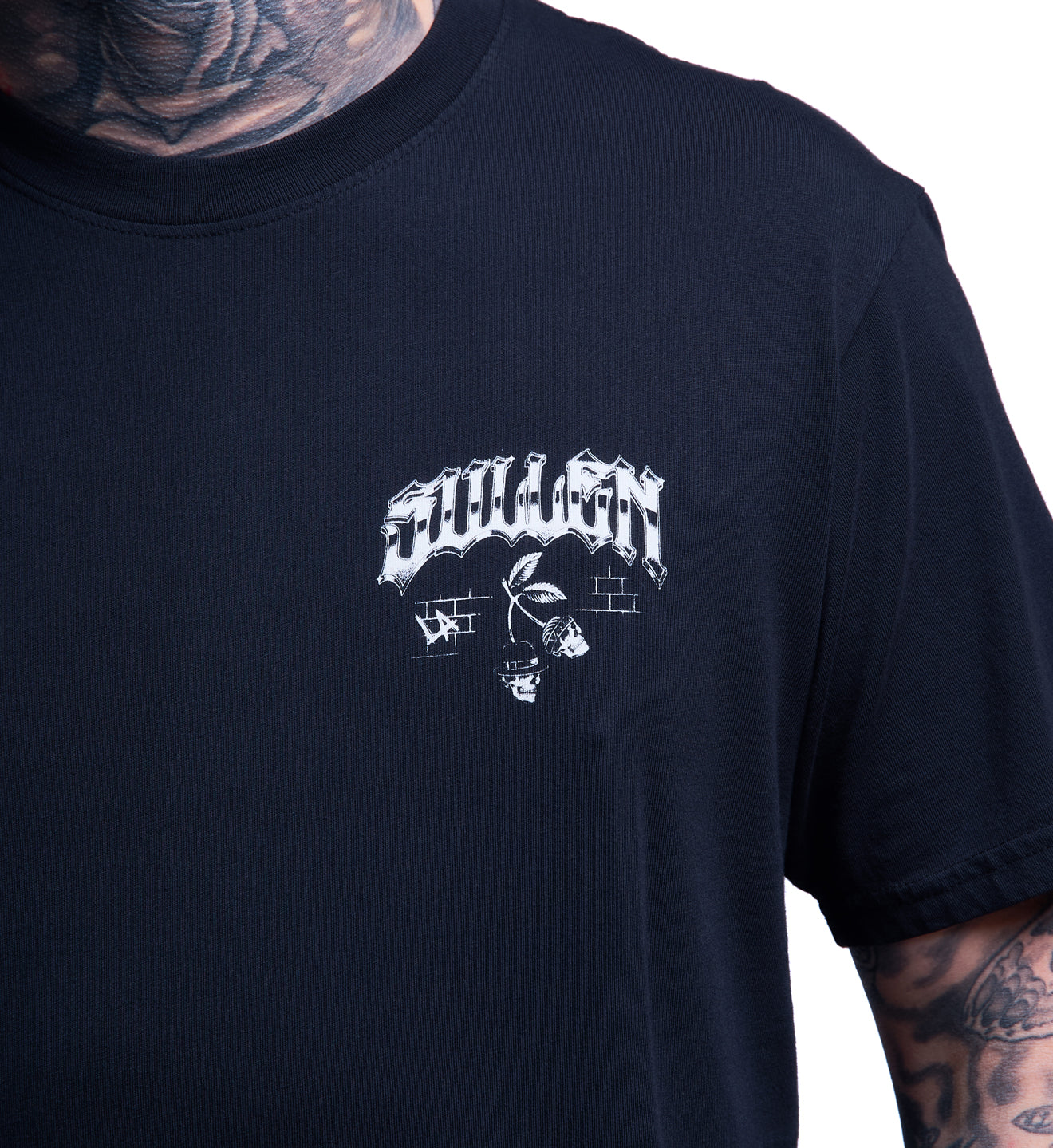 Black t-shirt with white graphic design on a plain background