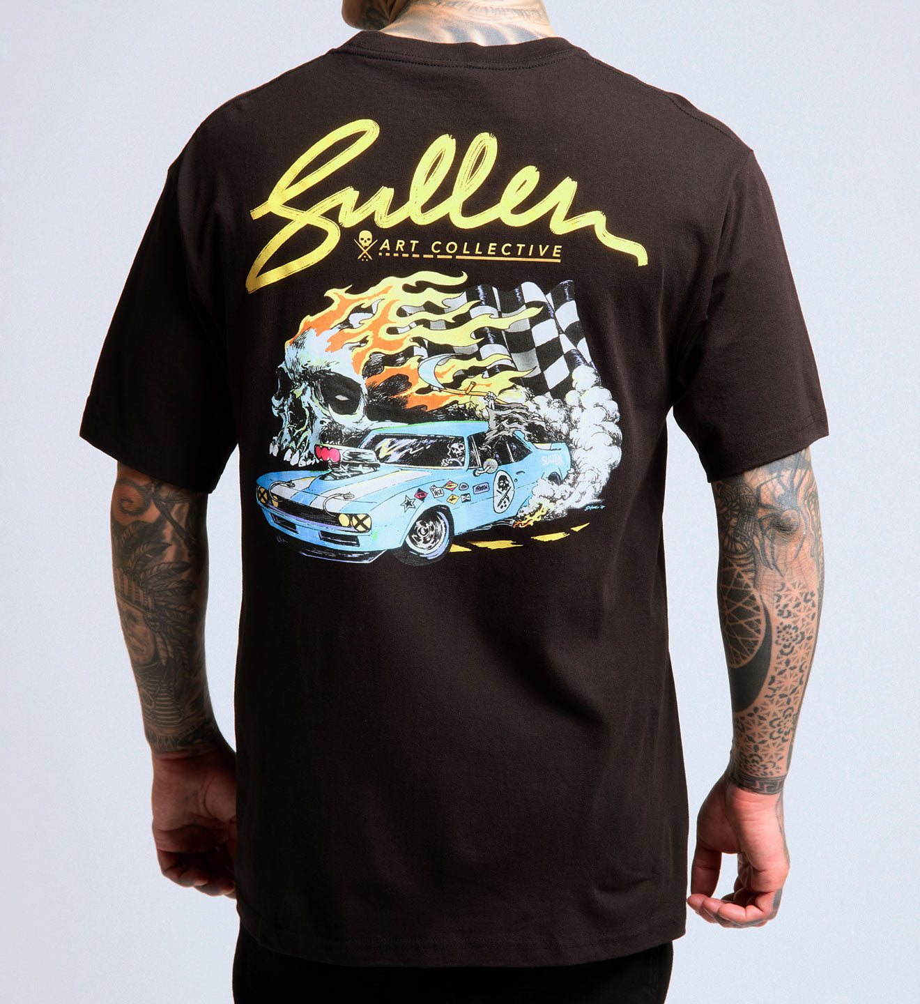 Black t-shirt with a colorful graphic of a car and 'Sullen' branding on the back.