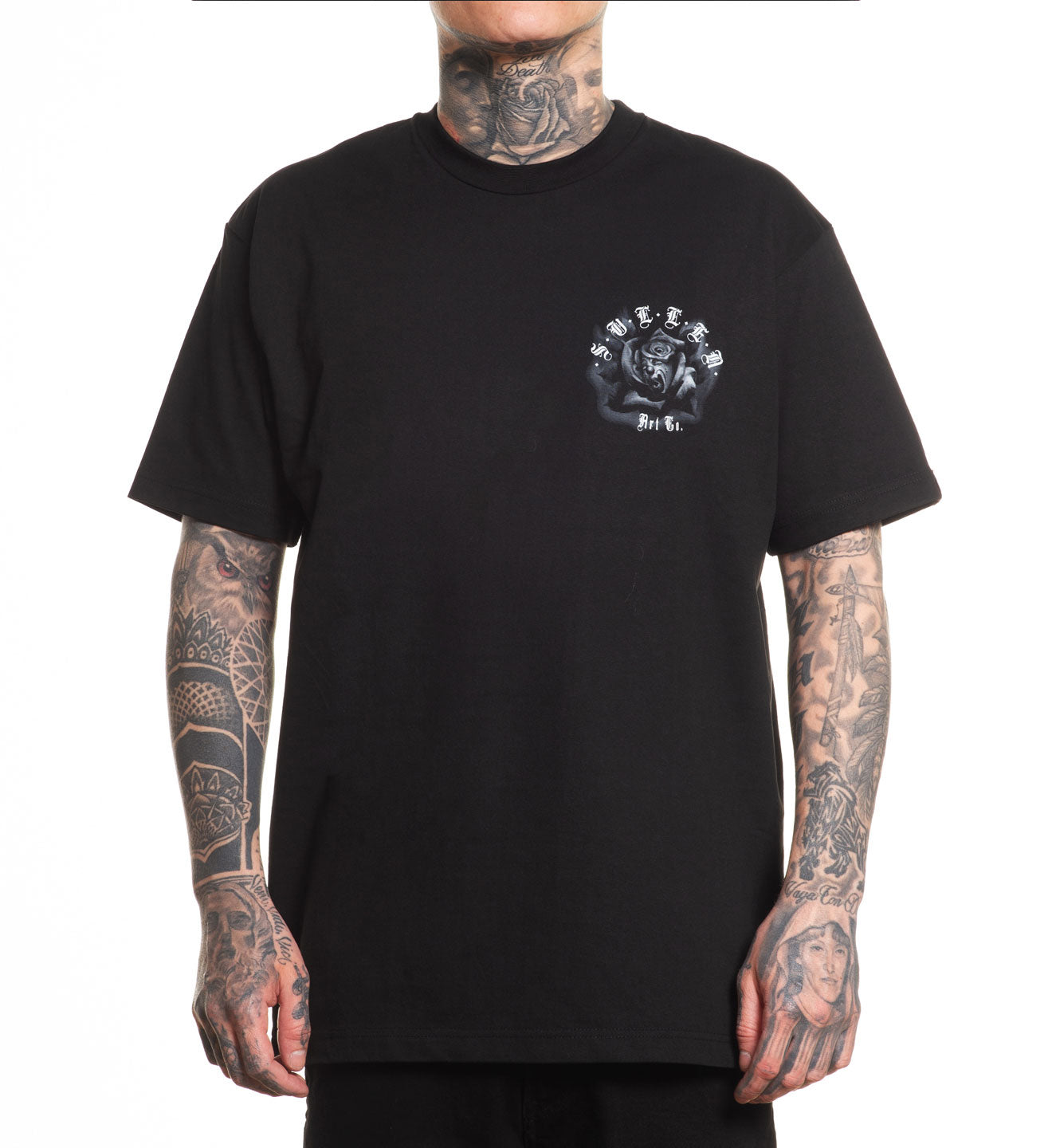 Person wearing a black t-shirt with a logo on a white background
