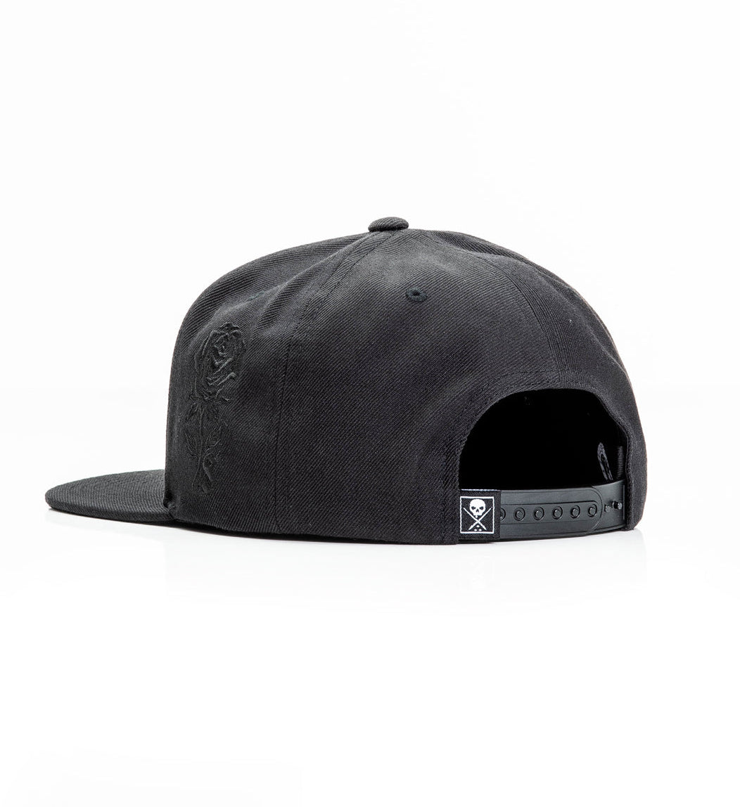 Black cap with a brand logo on a white background