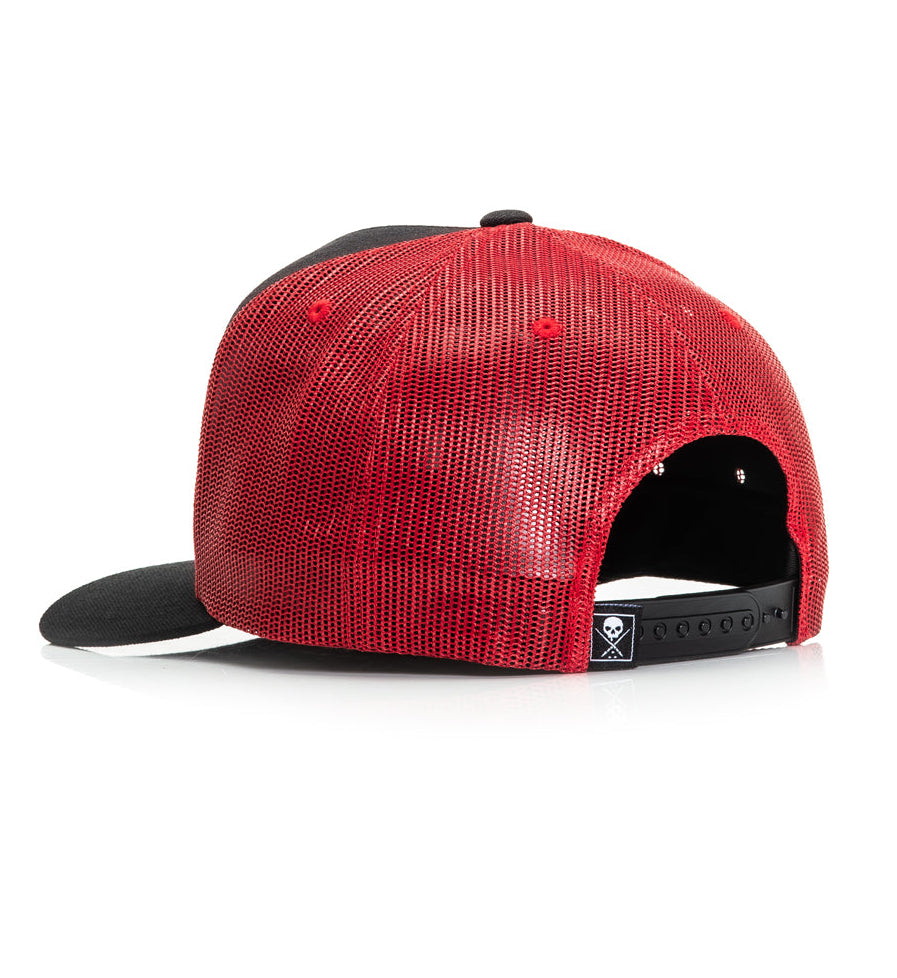 Red and black cap on a white background