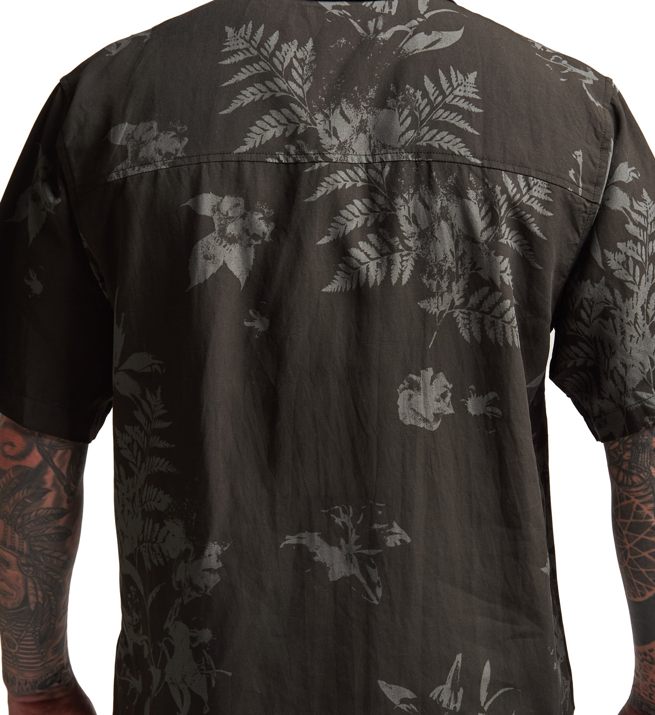 Black floral patterned shirt on a white background