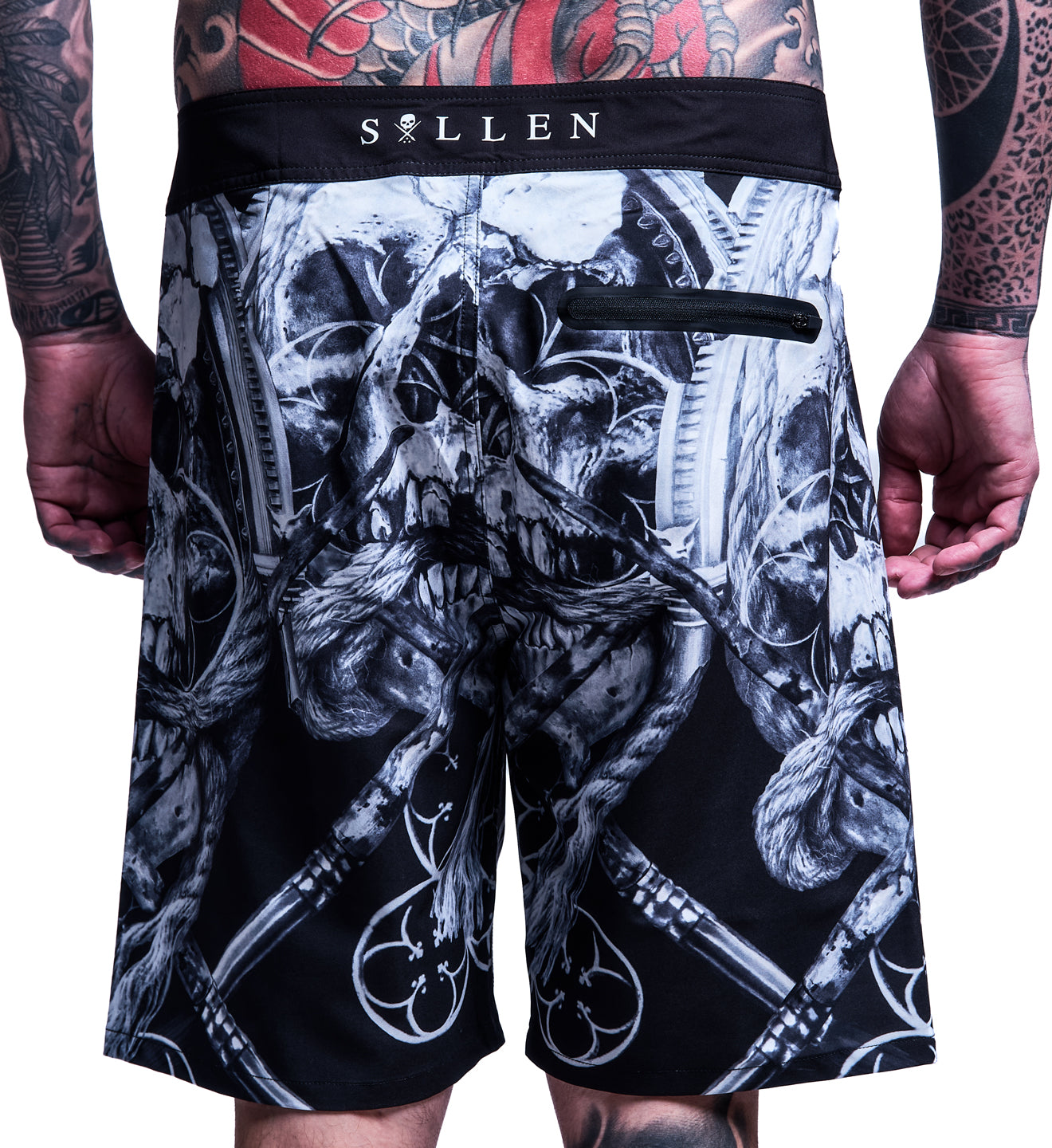 Black and white graphic shorts with tattoos on a person wearing 'Sullen' brand underwear.