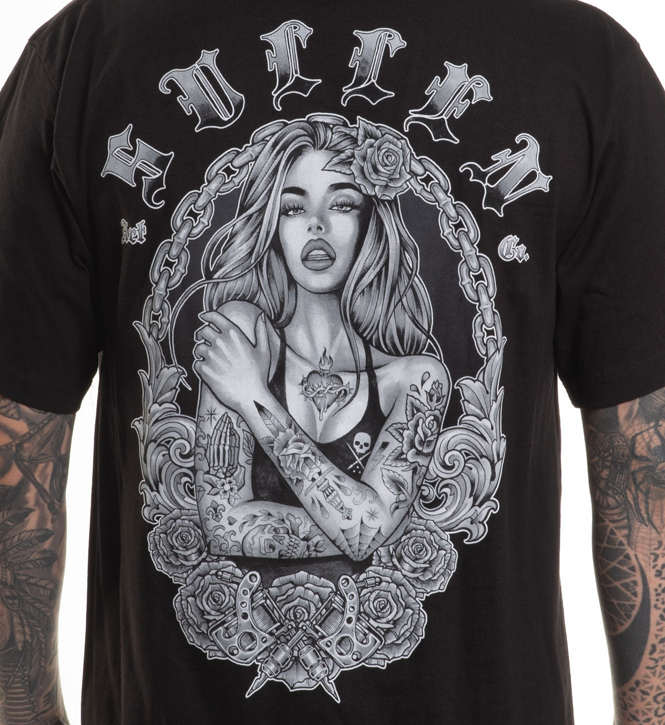 Black t-shirt with a graphic design of a woman with tattoos and roses on a white background