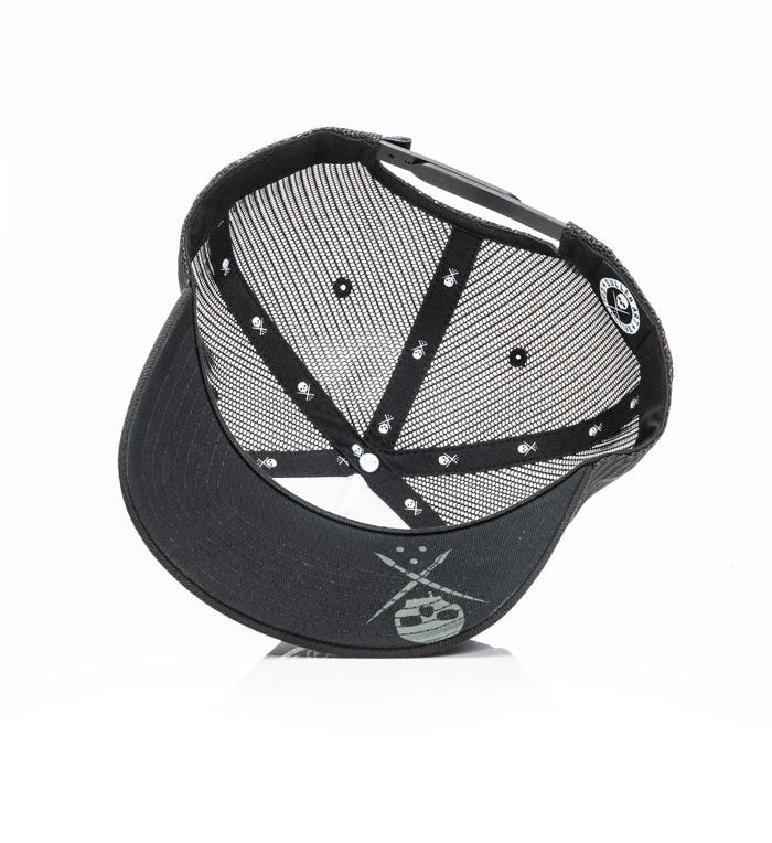 Black cap with white pattern on a white background