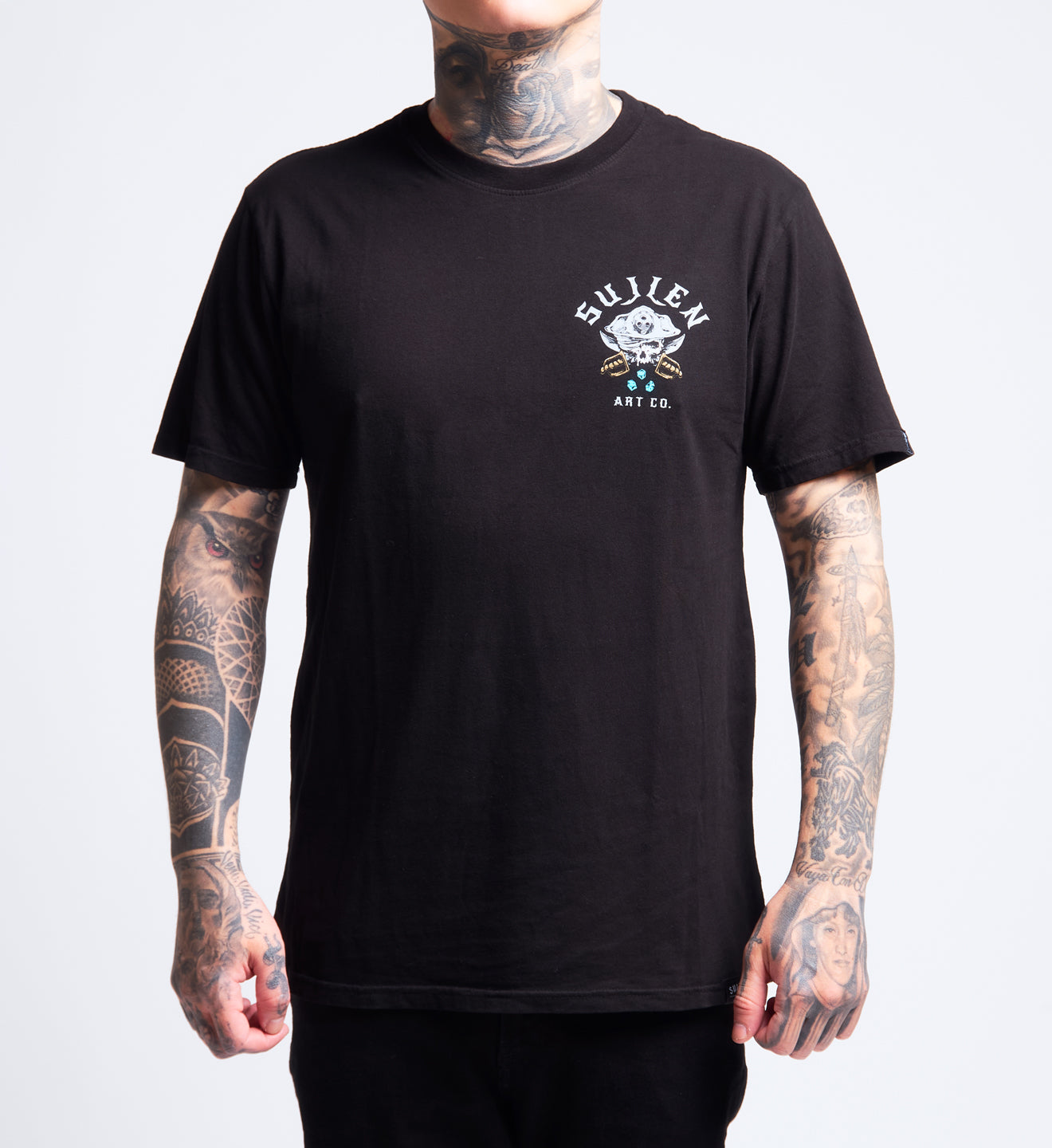 Person wearing a black t-shirt with a logo and text on a plain background
