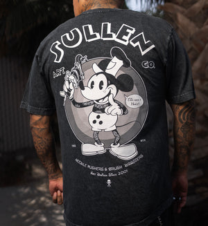 Person wearing a black t-shirt with a graphic design and text on the back.