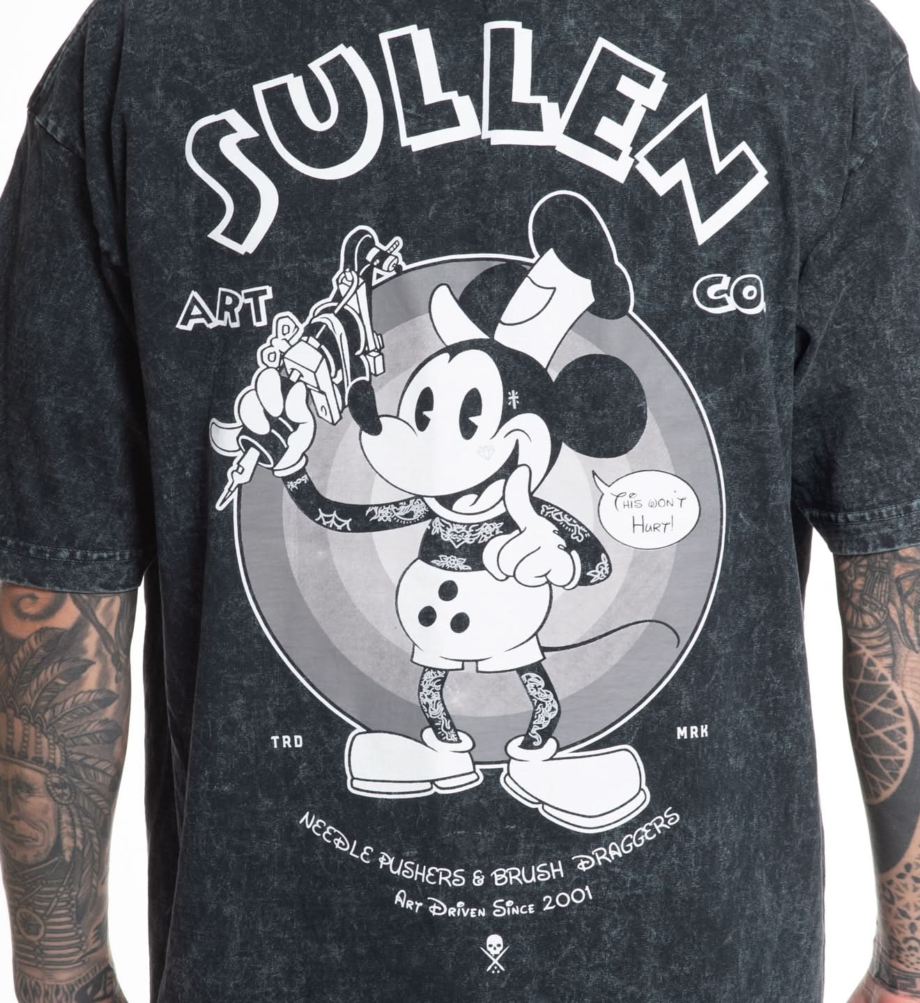Black t-shirt with a graphic design of a cartoon character and 'Sullen Art Co' text on the back.