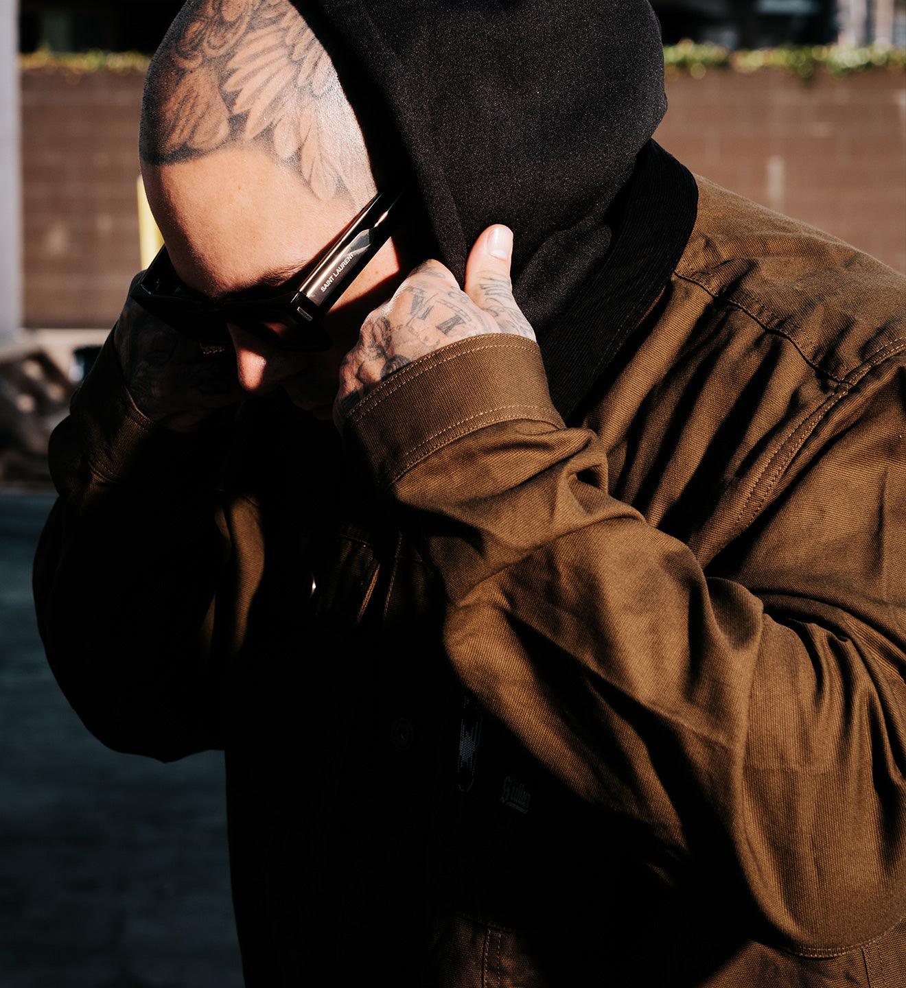 SURVIVALIST_DKGLD_Jacket_Lifestyle_1 - Sullen