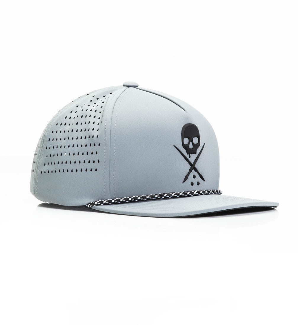 White cap with skull and crossbones design on a white background