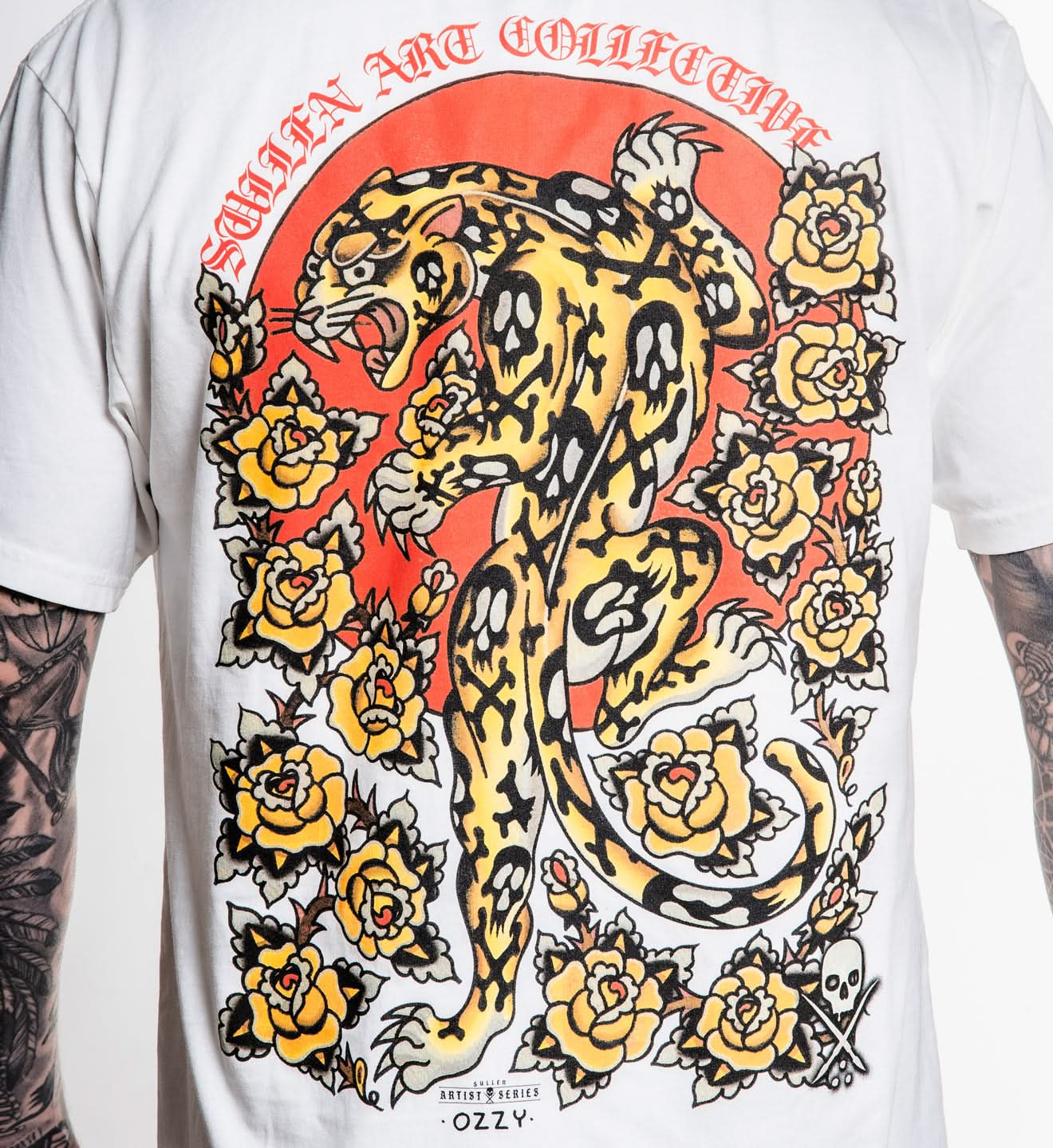 White t-shirt with a colorful graphic of a panther and flowers on a white background