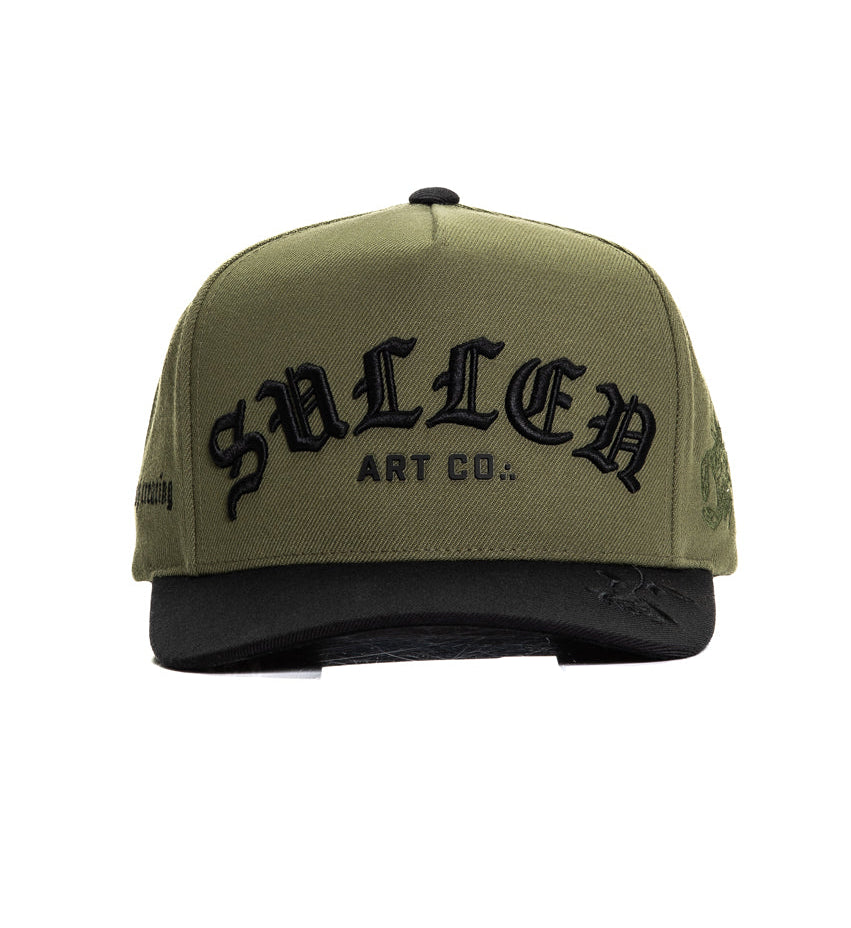 Green cap with black text on a white background